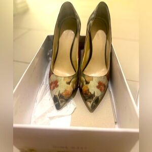 Worn but still in okay condition. Shows: scratches, scuffs worn heals.